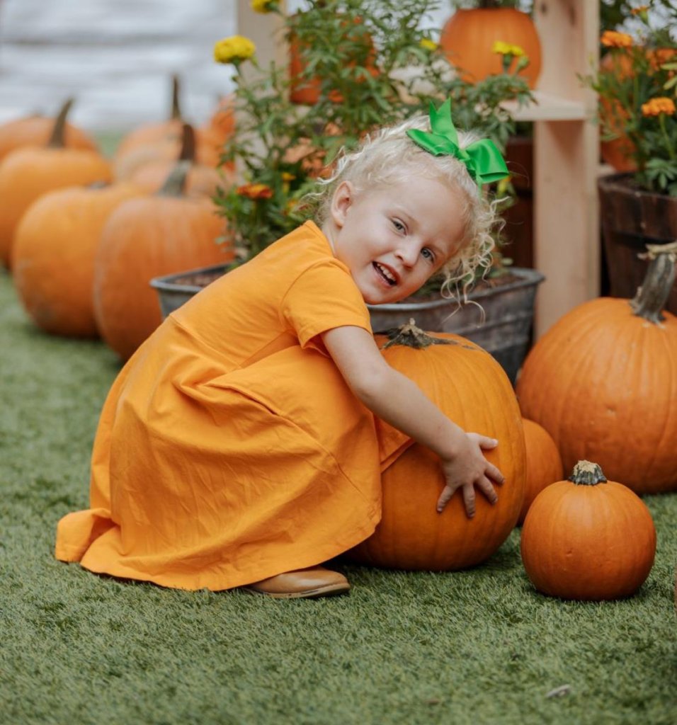 Girl at the Pumpkin Patch at The Square
