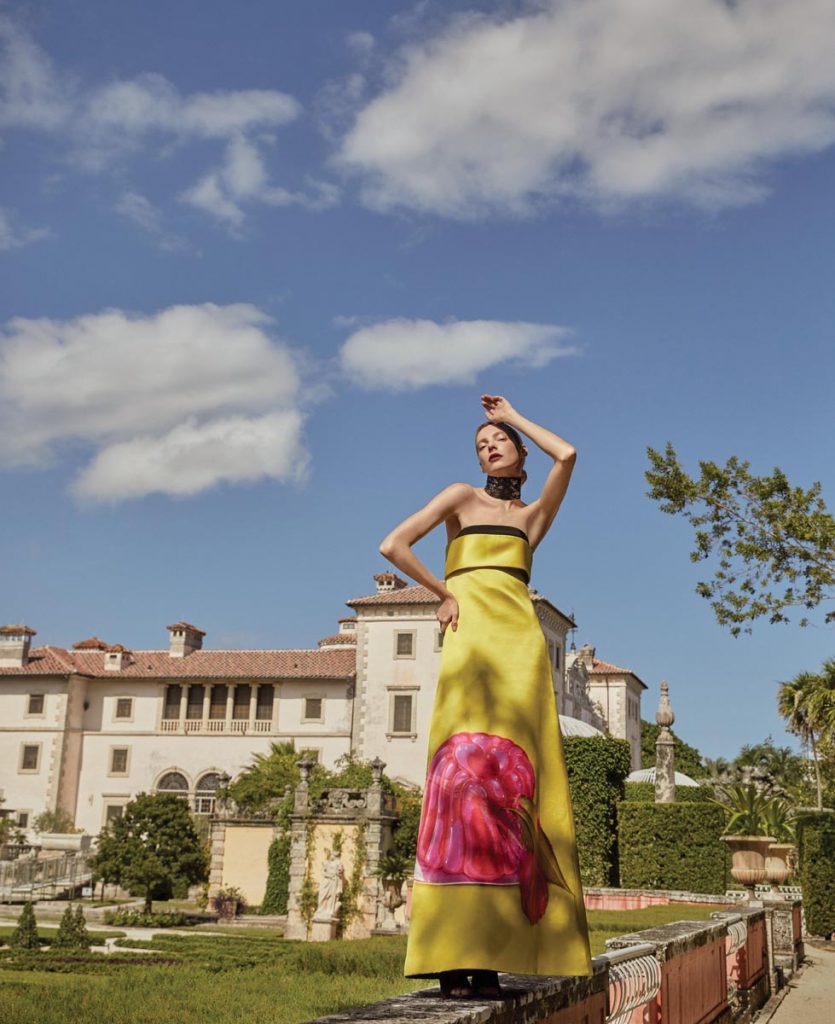 Yellow silk evening dress with printed detail ($19,000), mid-heel slides in black neoprene fabric ($1,250), Gucci